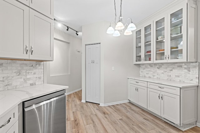 1553 Catalina Ln, Aurora, IL 60504 - kitchen with dishwasher, light wood finished floors, decorative backsplash, and a chandelier