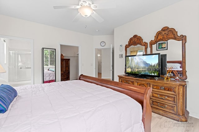 1553 Catalina Ln, Aurora, IL 60504 - bedroom with wood finished floors, ceiling fan, and ensuite bath