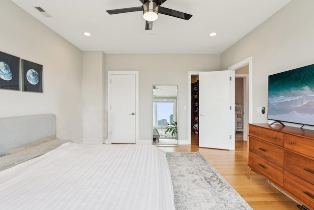 650 N Morgan St Unit 303, Chicago, IL 60642 - bedroom featuring light wood-style floors, a ceiling fan, and recessed lighting