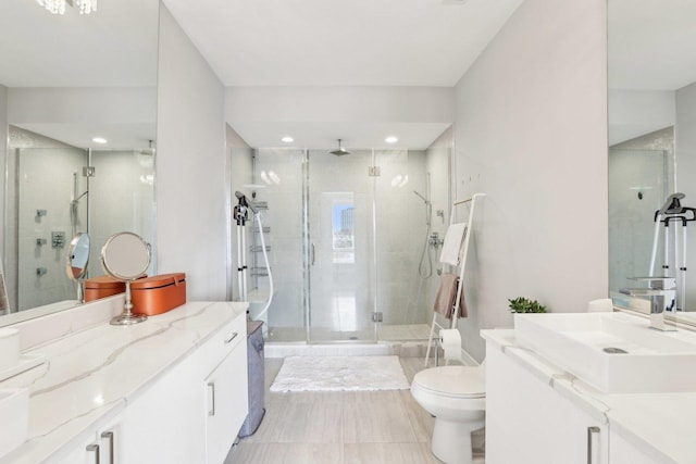 650 N Morgan St Unit 303, Chicago, IL 60642 - full bath featuring a stall shower, vanity, toilet, and recessed lighting