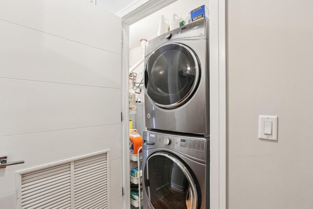 650 N Morgan St Unit 303, Chicago, IL 60642 - washroom featuring estacked washer and dryer