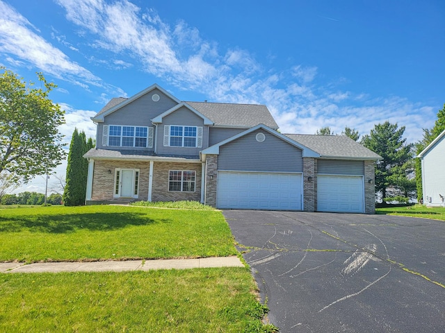 383 Prairie Knoll Dr, Poplar Grove, IL 61065 - view of front facade featuring asphalt driveway, a garage, and a front yard