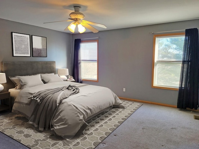 383 Prairie Knoll Dr, Poplar Grove, IL 61065 - carpeted bedroom with multiple windows, baseboards, and a ceiling fan