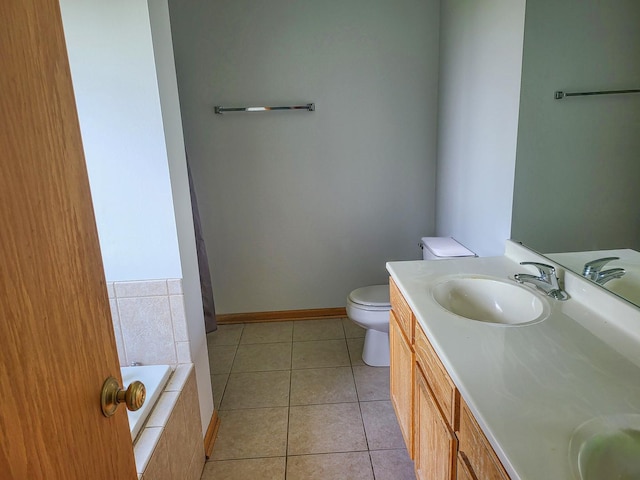 383 Prairie Knoll Dr, Poplar Grove, IL 61065 - bathroom with double vanity, tiled tub, and tile patterned flooring