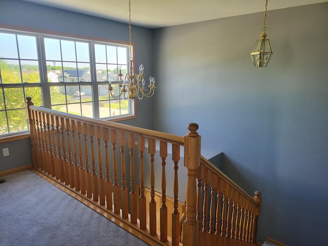 383 Prairie Knoll Dr, Poplar Grove, IL 61065 - stairs with a chandelier, healthy amount of natural light, carpet, and baseboards