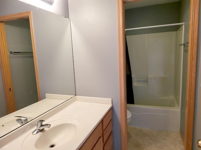 383 Prairie Knoll Dr, Poplar Grove, IL 61065 - bathroom featuring vanity, toilet, and bathing tub / shower combination