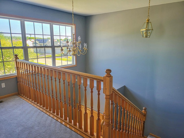 383 Prairie Knoll Dr, Poplar Grove, IL 61065 - stairway with a chandelier, healthy amount of natural light, and carpet floors