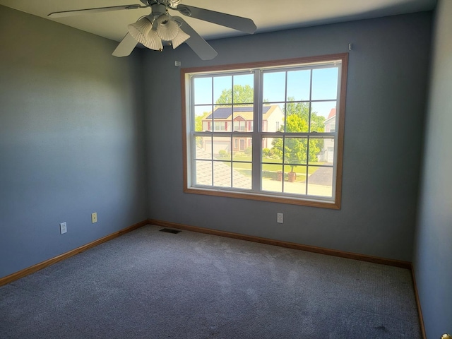383 Prairie Knoll Dr, Poplar Grove, IL 61065 - unfurnished room with carpet, baseboards, and a ceiling fan