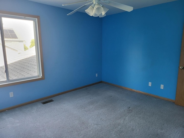 383 Prairie Knoll Dr, Poplar Grove, IL 61065 - spare room featuring carpet floors, ceiling fan, and baseboards