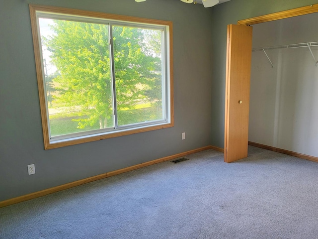 383 Prairie Knoll Dr, Poplar Grove, IL 61065 - unfurnished bedroom with carpet floors and a closet