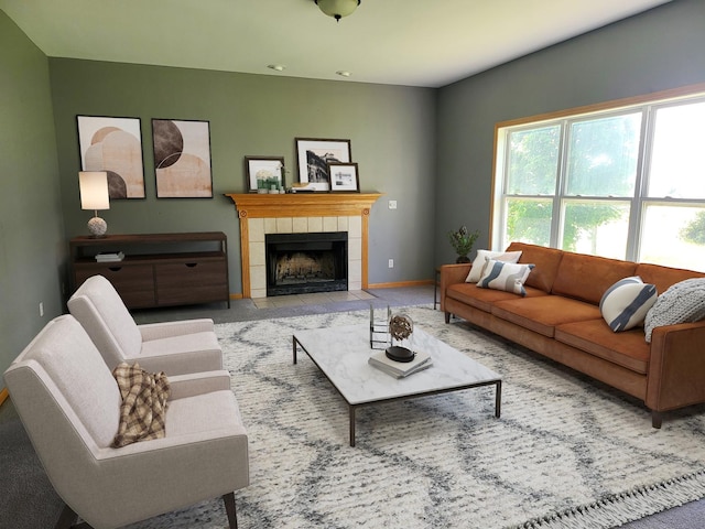 383 Prairie Knoll Dr, Poplar Grove, IL 61065 - living area with a fireplace and baseboards