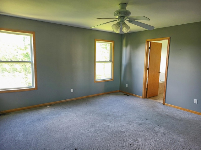 383 Prairie Knoll Dr, Poplar Grove, IL 61065 - unfurnished room featuring carpet flooring and ceiling fan