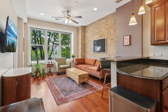 1626 S Morgan St Unit 2, Chicago, IL 60608 - living room with wood finished floors, a ceiling fan, and recessed lighting