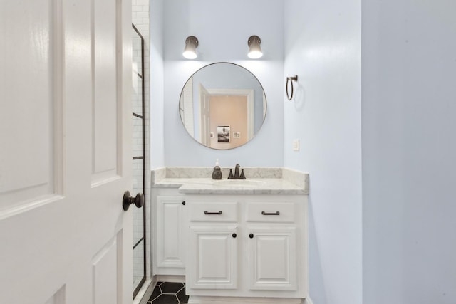 1626 S Morgan St Unit 2, Chicago, IL 60608 - bathroom featuring vanity, a tile shower, and tile patterned floors