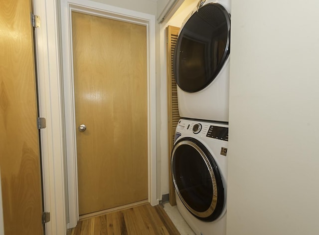420 S Clinton St Unit 408A, Chicago, IL 60607 - laundry room with estacked washer and dryer and wood finished floors