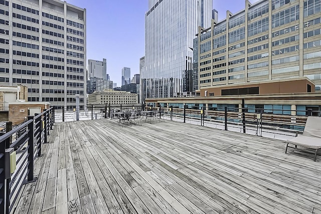 420 S Clinton St Unit 408A, Chicago, IL 60607 - wooden deck featuring a view of skyline