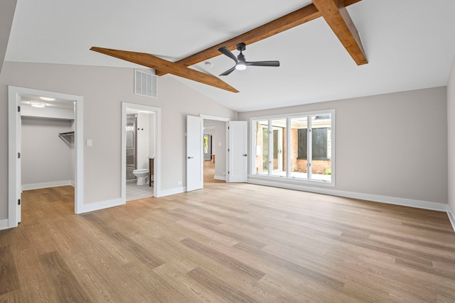 18908 E Louise Dr, Lansing, IL 60438 - unfurnished bedroom with a spacious closet, light wood-style flooring, baseboards, and connected bathroom
