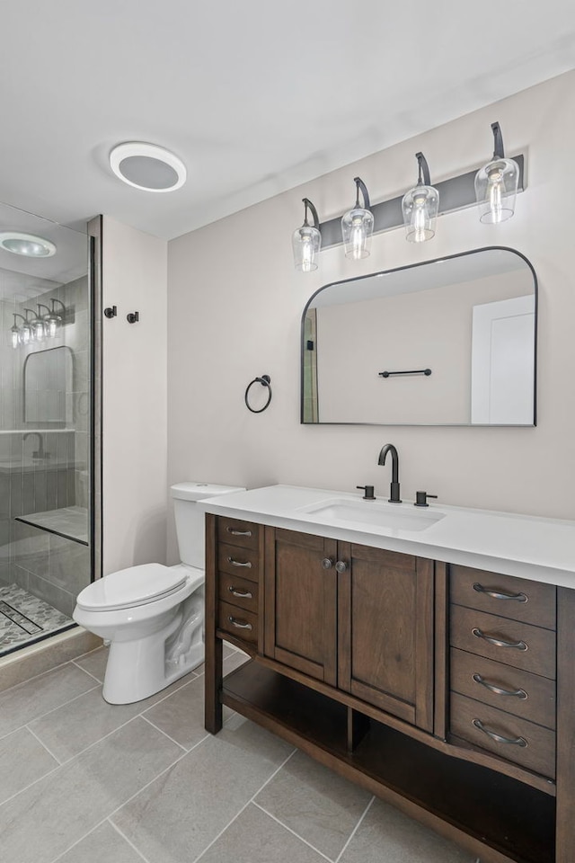 18908 E Louise Dr, Lansing, IL 60438 - full bathroom with vanity, toilet, a shower stall, and tile patterned flooring