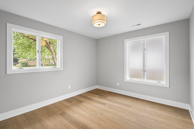 18908 E Louise Dr, Lansing, IL 60438 - empty room featuring light wood-style floors and baseboards