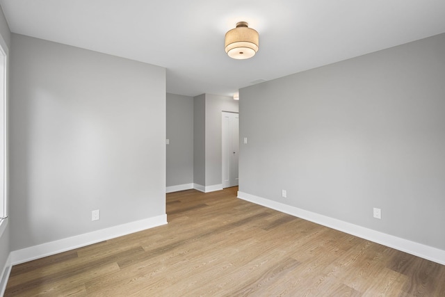 18908 E Louise Dr, Lansing, IL 60438 - spare room featuring baseboards and wood finished floors