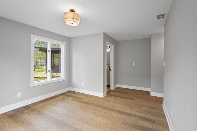 18908 E Louise Dr, Lansing, IL 60438 - spare room with wood finished floors and baseboards