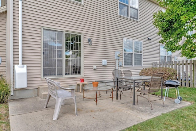 3911 Summer Sage Ct, Champaign, IL 61822 - view of patio featuring grilling area and outdoor dining space