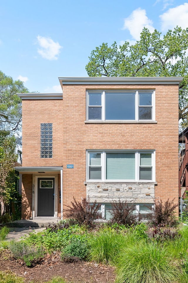 318 Custer Ave, Evanston, IL 60202 - view of front of house with stone siding and brick siding