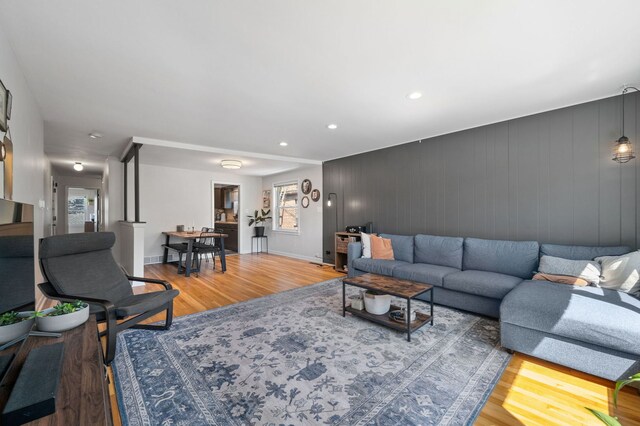318 Custer Ave, Evanston, IL 60202 - living area featuring wood finished floors, recessed lighting, and baseboards