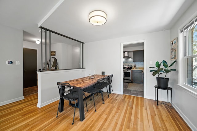 318 Custer Ave, Evanston, IL 60202 - dining area featuring light wood-type flooring and baseboards