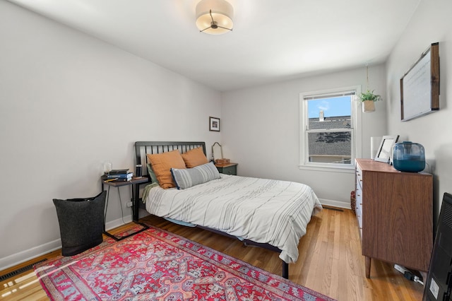 318 Custer Ave, Evanston, IL 60202 - bedroom with wood finished floors and baseboards