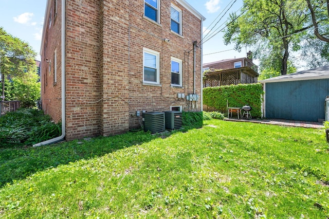 318 Custer Ave, Evanston, IL 60202 - view of home's exterior with brick siding and central AC