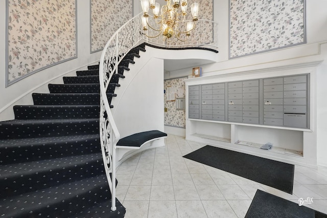 5500 Carriageway Dr Unit 213, Rolling Meadows, IL 60008 - stairway with mail area, tile patterned flooring, and a chandelier