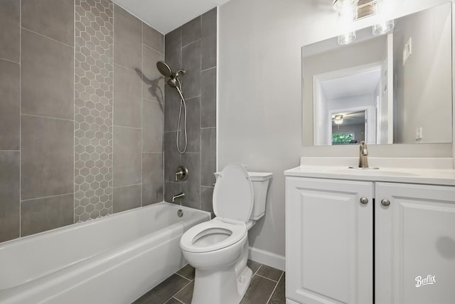 5500 Carriageway Dr Unit 213, Rolling Meadows, IL 60008 - bathroom with toilet, vanity, shower / bath combination, baseboards, and tile patterned flooring