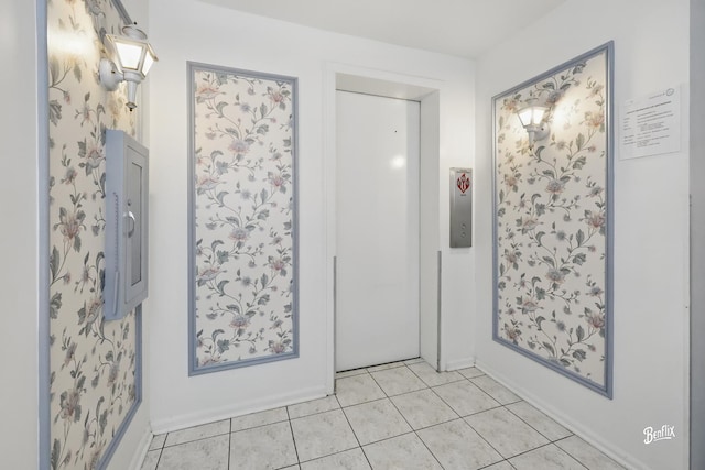 5500 Carriageway Dr Unit 213, Rolling Meadows, IL 60008 - bathroom with tile patterned flooring, elevator, and baseboards