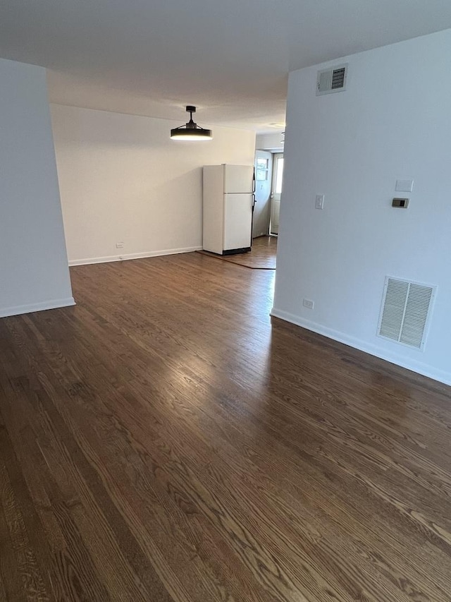 7 Garden Dr Unit 7, La Grange Park, IL 60526 - unfurnished room featuring dark wood-type flooring and baseboards