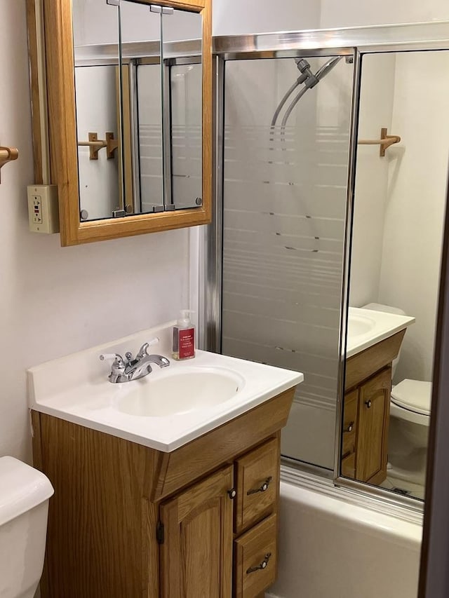 7 Garden Dr Unit 7, La Grange Park, IL 60526 - bathroom with toilet, vanity, and shower / bath combination with glass door