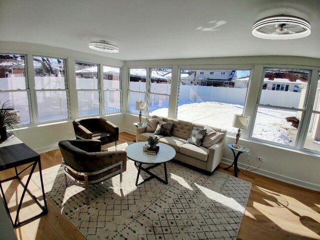 7726 N Harlem Ave, Niles, IL 60714 - sunroom featuring healthy amount of natural light, wood finished floors, and baseboards
