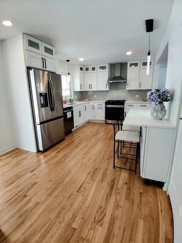 7726 N Harlem Ave, Niles, IL 60714 - kitchen featuring stainless steel fridge, wall chimney exhaust hood, range, dishwasher, and light countertops