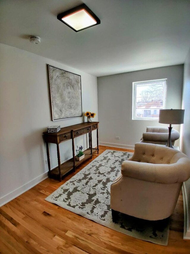7726 N Harlem Ave, Niles, IL 60714 - sitting room featuring wood finished floors and baseboards
