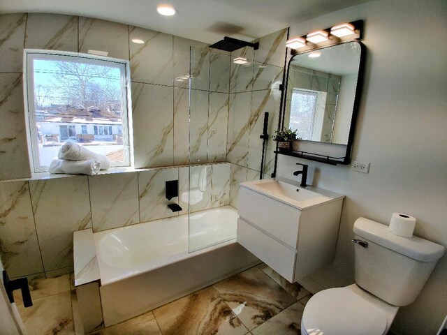 7726 N Harlem Ave, Niles, IL 60714 - bathroom with toilet, vanity, and tub / shower combination