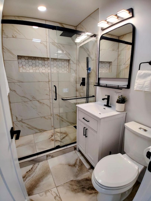7726 N Harlem Ave, Niles, IL 60714 - bathroom featuring marble finish floors, a stall shower, vanity, toilet, and recessed lighting