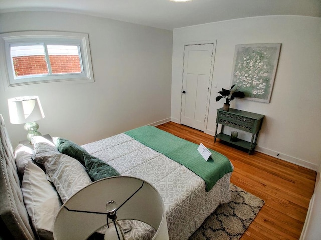 7726 N Harlem Ave, Niles, IL 60714 - bedroom with wood finished floors and baseboards