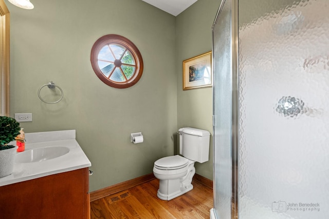 1514 Triple Crown Ct, Saint Charles, IL 60174 - full bathroom featuring vanity, wood finished floors, a shower stall, and baseboards