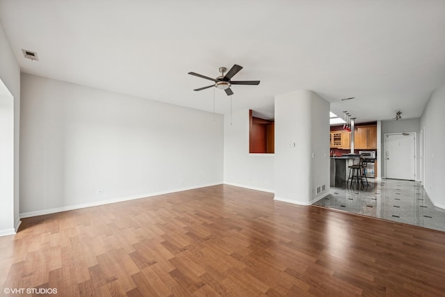 1 Renaissance Pl Unit 4Ph, Palatine, IL 60067 - unfurnished living room with light wood-style floors and a ceiling fan