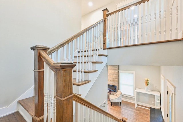 93 Liberty St, West Dundee, IL 60118 - staircase featuring wood finished floors, baseboards, and recessed lighting