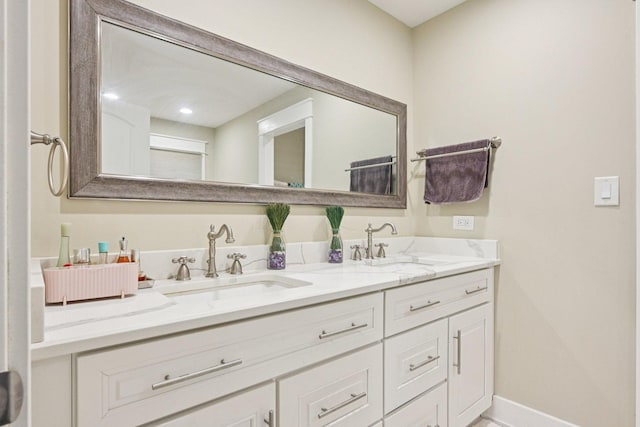 93 Liberty St, West Dundee, IL 60118 - bathroom with double vanity and baseboards