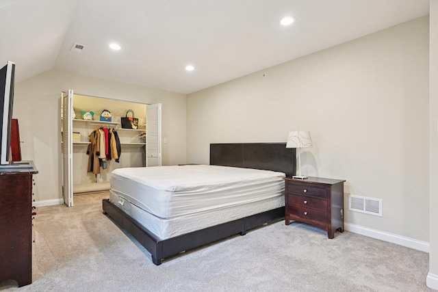 93 Liberty St, West Dundee, IL 60118 - bedroom featuring light colored carpet, a spacious closet, baseboards, vaulted ceiling, and recessed lighting
