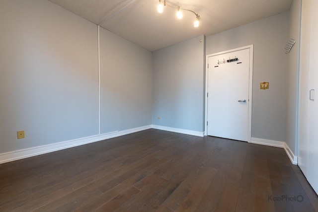 222 N Columbus Dr Unit 2808, Chicago, IL 60601 - spare room with dark wood-type flooring and baseboards