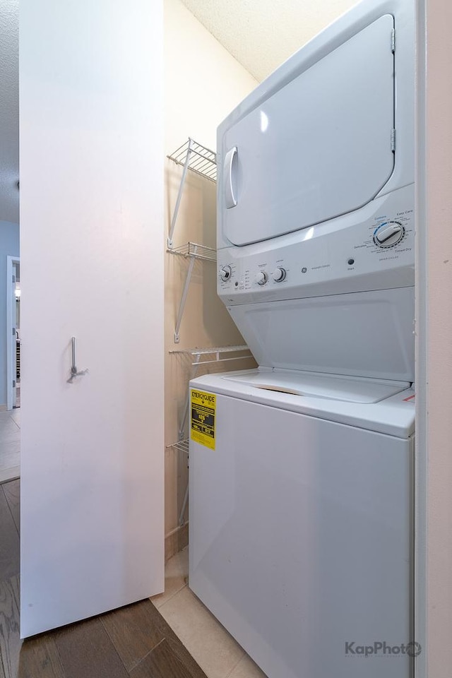 222 N Columbus Dr Unit 2808, Chicago, IL 60601 - laundry room featuring stacked washing machine and dryer