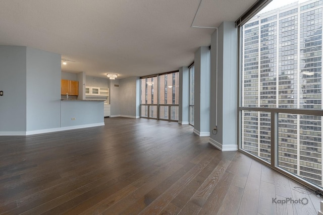 222 N Columbus Dr Unit 2808, Chicago, IL 60601 - unfurnished living room with baseboards, dark wood finished floors, and floor to ceiling windows